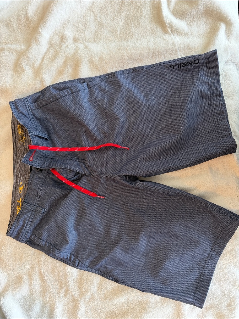 O'Neill Men's Blue Hybrid Board Shorts with Red Drawcord Size 28 waist.